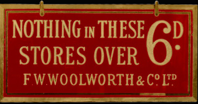 Sandblasted gold on maroon glass signs like this one adorned every aisle of Woolworths' stores in the 1930s. The Nothing over Sixpence slogan summed up everything that the firm stood for in just three words. Click for a larger version of the sign in a new window.