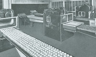 A long view of the equipment at Savoy's Biscuit Factory, pictured for a feature in Woolworths' staff magazine in 1936. Click for a larger copy in a new window