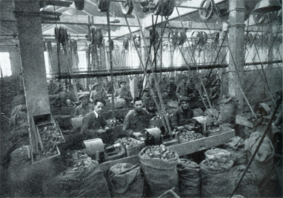 A factory dedicated to making gentlemen's (tobacco) pipes for Woolworths in the 1930s. Showing how life has changed, most blokes were smokers at the time! Click for a larger version in new window.