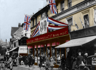 Celebrating the Silver Jubilee of HM King George V and Queen Mary, every Woolies store was dressed with bunting and flags in 1935.  But few could rival the elegance of the efforts of the store in Calverley Road in Royal Tunbridge Wells.  Click for a larger copy in a new window.